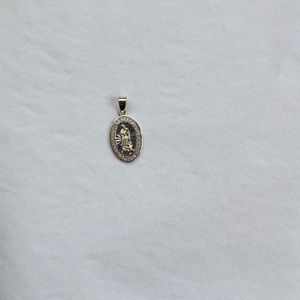 Little charm. Religious charm.
